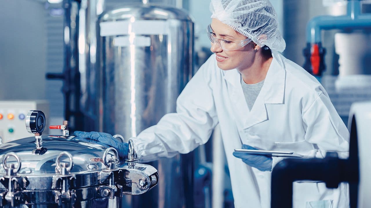 hygiene staff worker in foods and drinks clean factory. working women in water plant industry quality control check. | Image Credit: © Quality Stock Arts - © Quality Stock Arts - stock.adobe.com