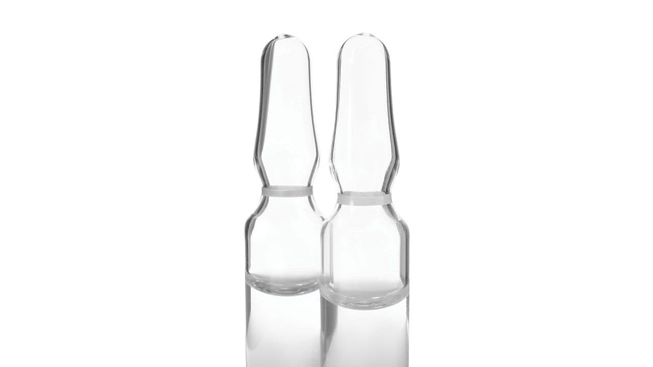 Pharmaceutical ampoules with medication on white background | Image Credit: ©New Africa - stock.adobe.com