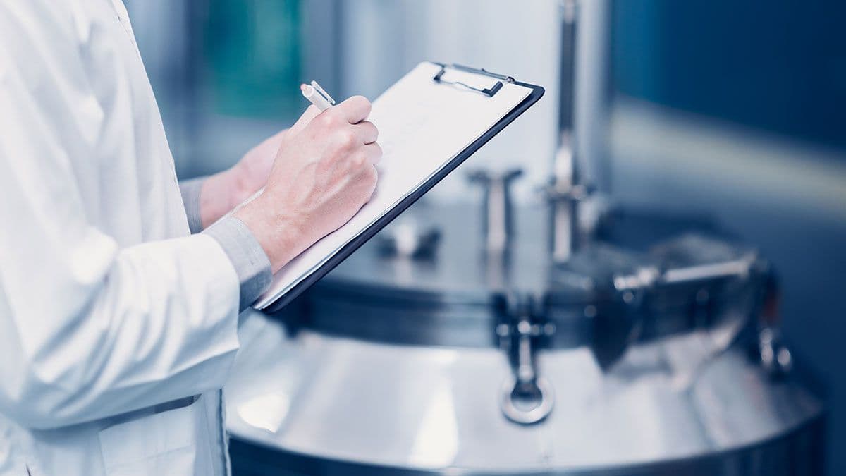 medicine science factory staff worker check quality products sterilize in autoclave tank in check list. | Image Credit: ©Quality Stock Arts - stock.adobe.com