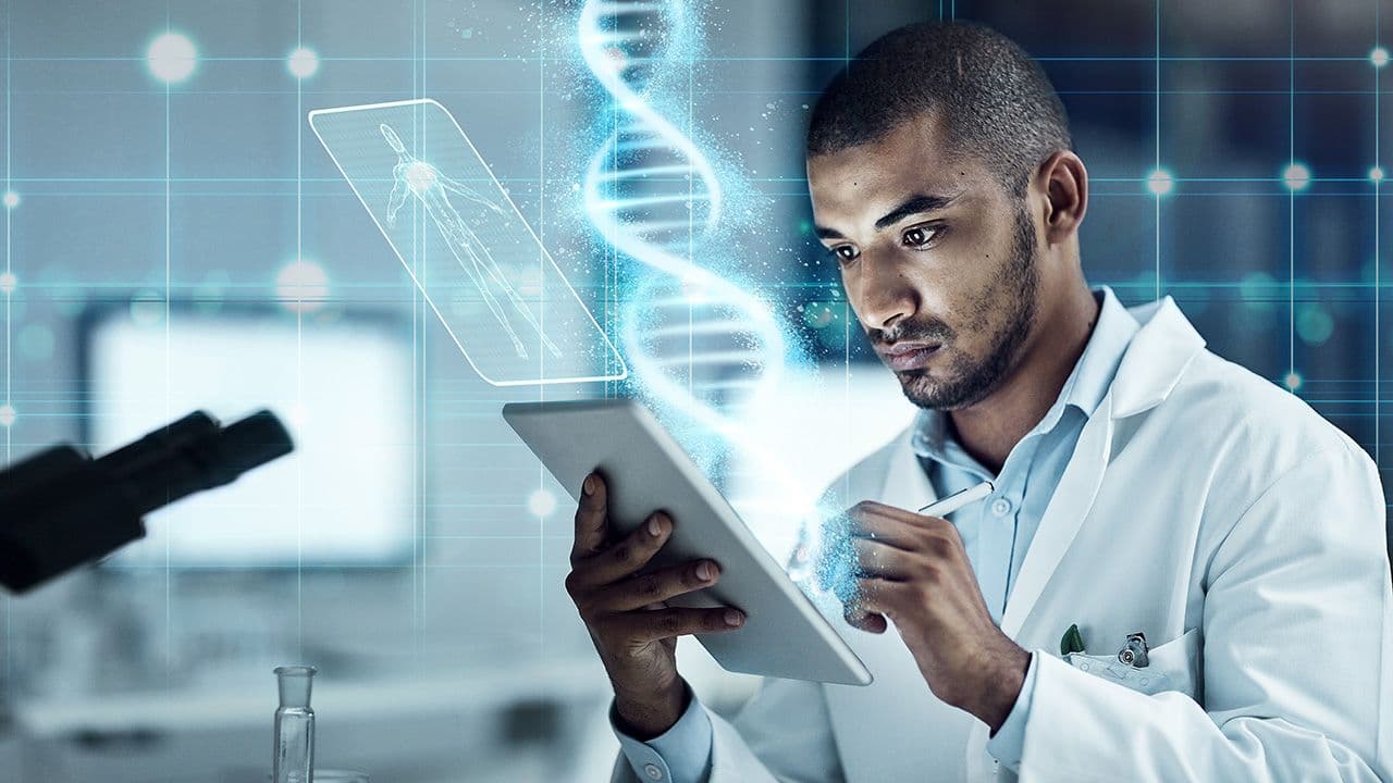 Scientist, tablet and laboratory with overlay for research, dna and medical writing with cloud computing. Man, doctor and mobile touchscreen for data analytics in lab with 3d holographic ux in night | Image Credit: © Chanelle M/peopleimages.com - © Chanelle M/peopleimages.com - Stock.Adobe.com